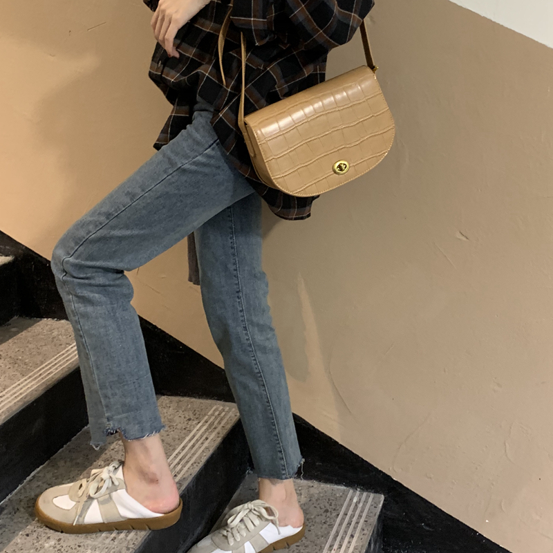 乌77酷帅撕边裤子女弹力高腰显瘦新款牛仔裤紧身九分