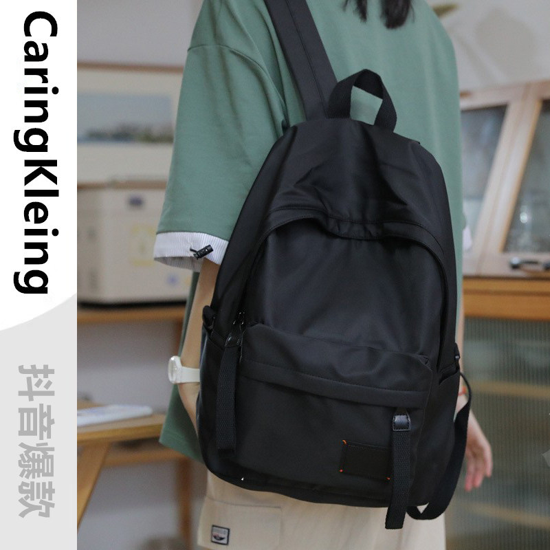 CaringKleing法国大牌背包男女款大容量双肩包学生休闲百搭旅行包