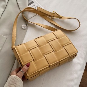 编织真皮女包软皮包图片