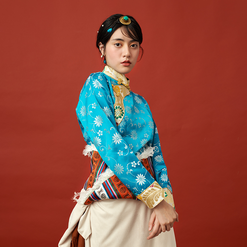 玛咕巴原创藏装的优惠券大全—花朵织锦缎蓝色上衣