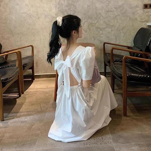 赫本风高级露背小黑裙女夏新款甜美气质辣妹镂空蝴蝶结初恋连衣裙
