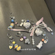 ins可爱卡通小动物车钥匙包包水杯挂链airpods耳机壳挂饰品