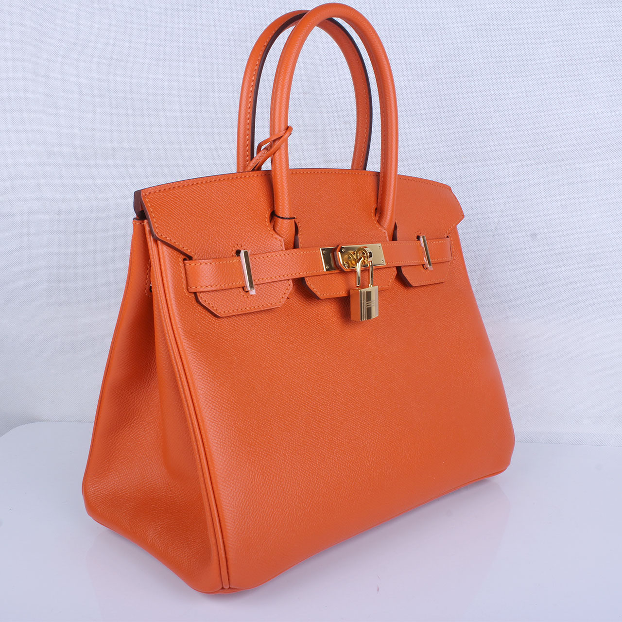 [9.9新]未使用hermes/爱马仕 经典橙色brinkin30 金扣 手袋