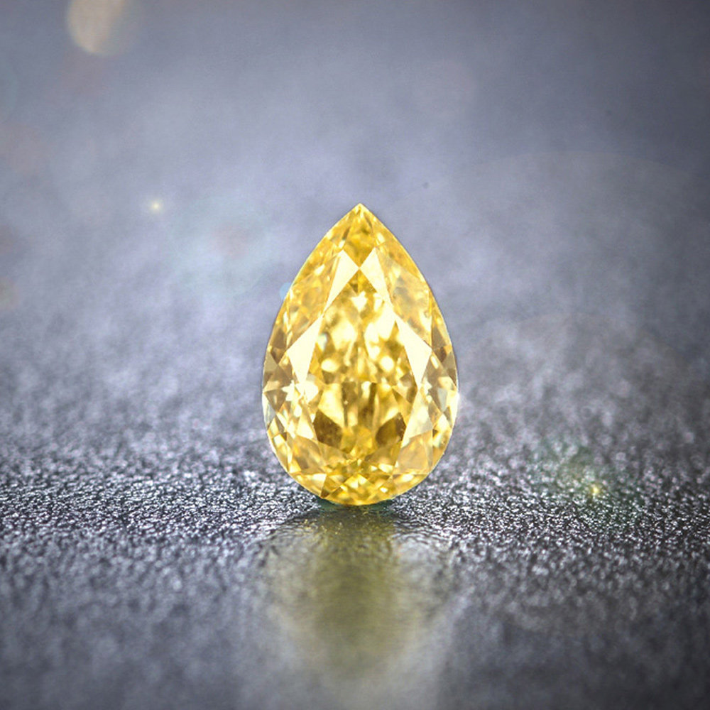 佐卡伊 0.7克拉 vs1净度f荧光gia垫形天然黄钻裸钻