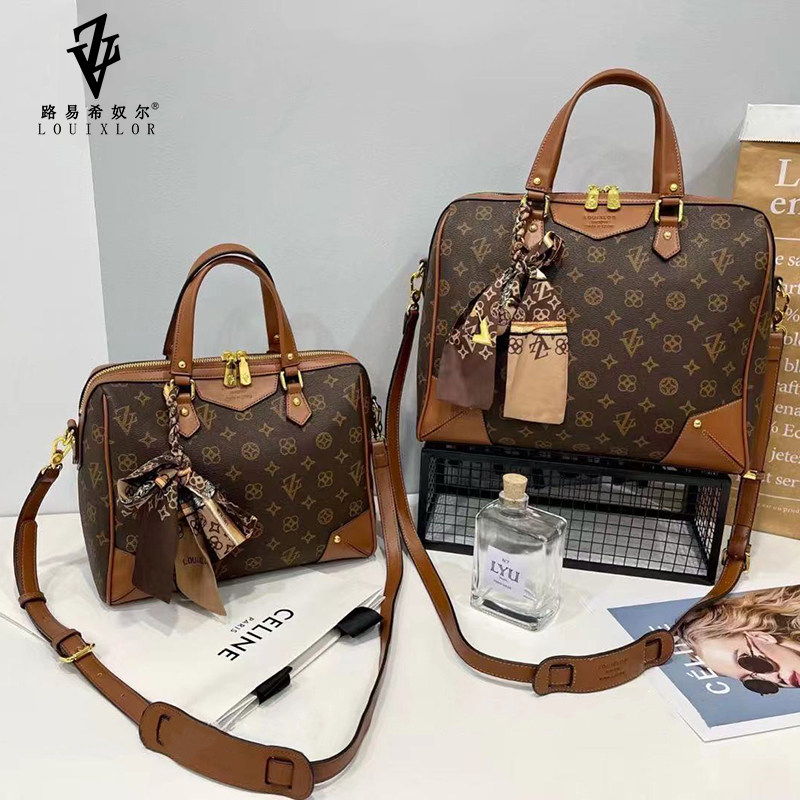 00券后价￥149路易希奴尔品牌女包2023夏新款欧美真皮老花法棍包百搭