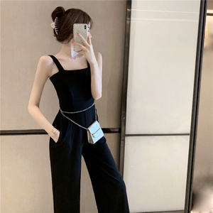 Real shooting summer seaside vacation sexy backless black thin hanging feeling one-sided shoulder strap wide leg Jumpsui