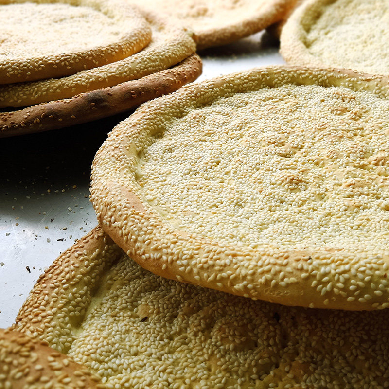 旌德大饼_新疆馕饼烤馕 手工牛奶芝麻馕皮牙子油馕 正宗囊大饼特产
