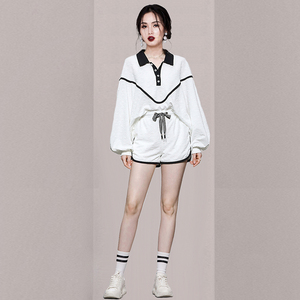 2022 spring new Korean casual slim knitted lantern sleeves black and white contrast LACE UP SHORTS SET