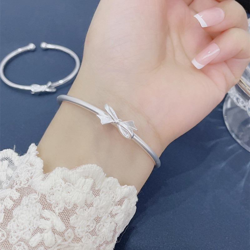 s999蝴蝶结银手镯女纯银气质小众设计高级感手环年轻款公主银镯