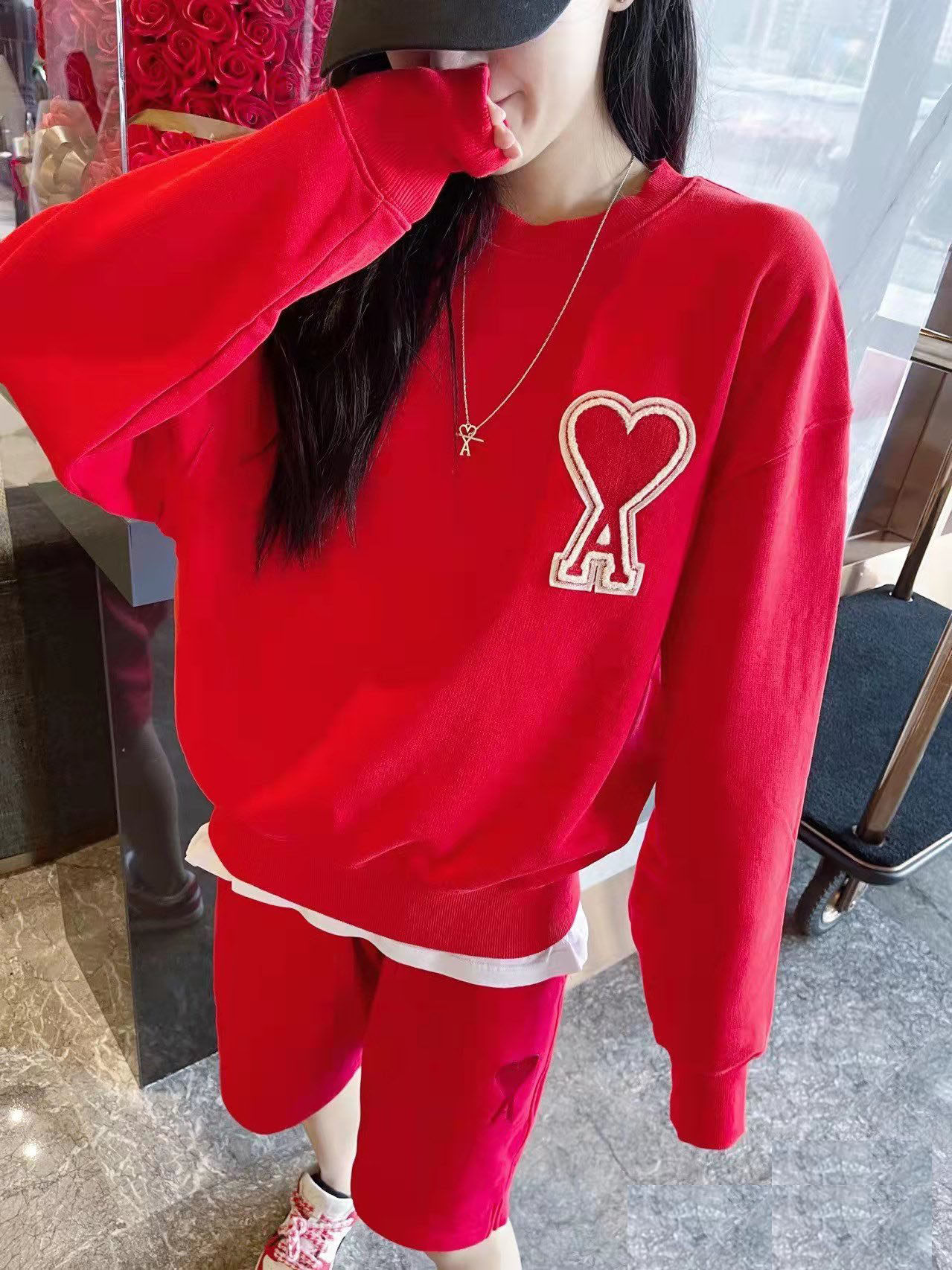 ami爱心宽松套头连帽卫衣