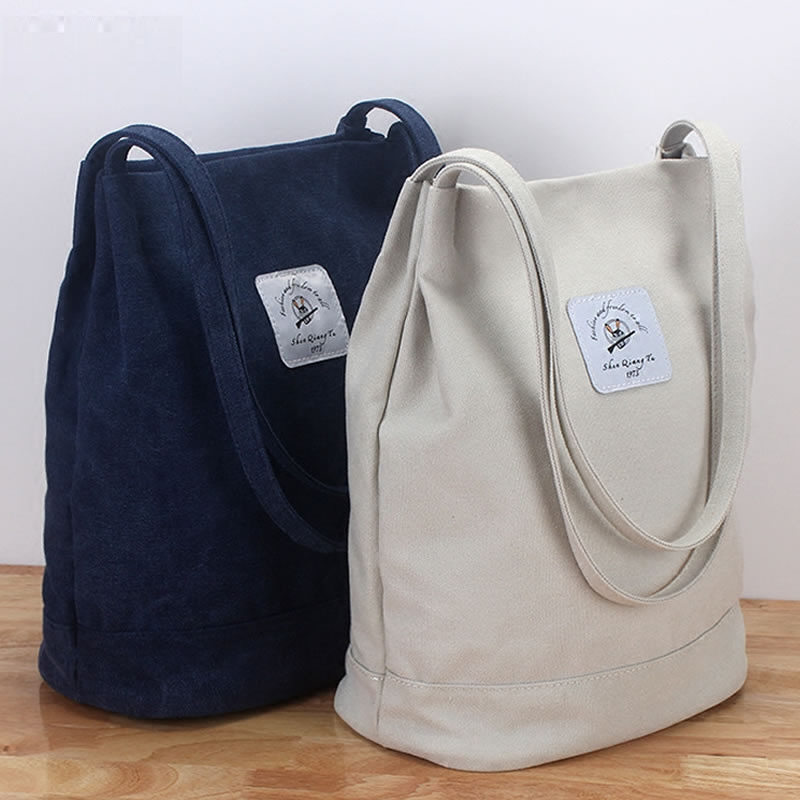 他他商城 箱包 新款帆布包女包大容量水桶包韩版时尚单肩手提包学院风