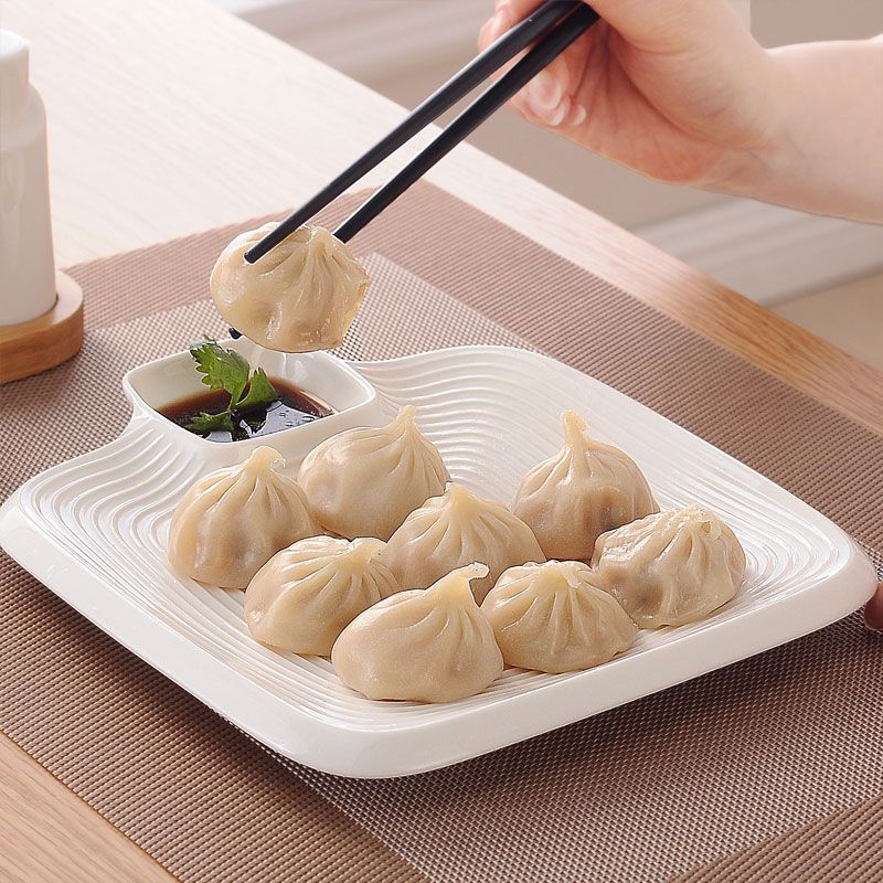沥水陶瓷圆形家用骨瓷饺子盘55元陶瓷纯白色带酷西式创意点心盘子19