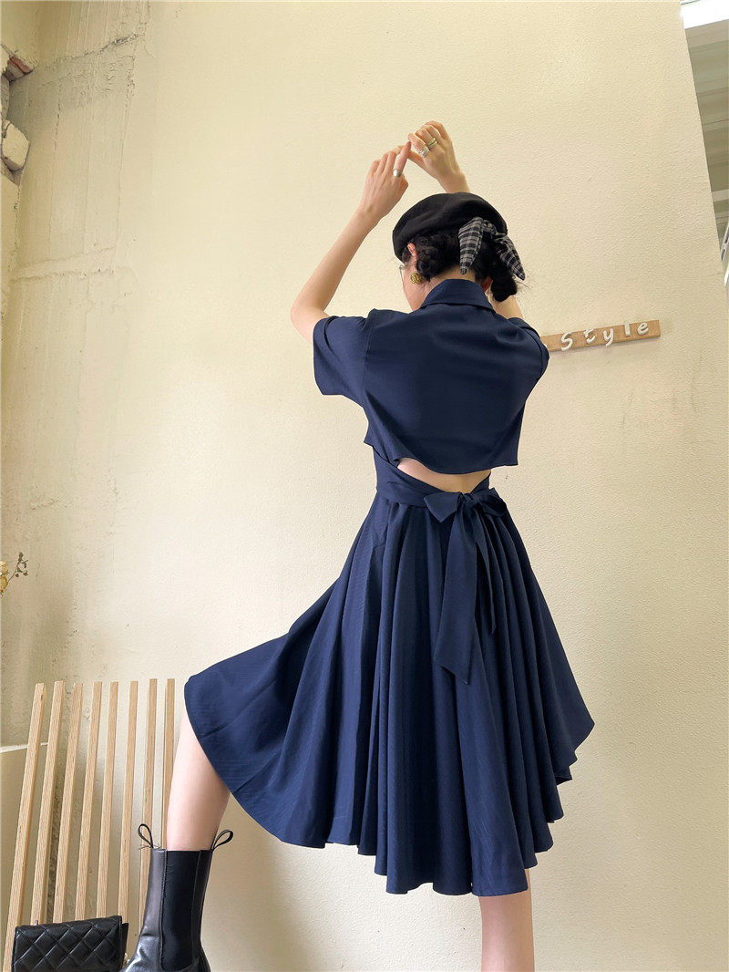 不规则漏腰连衣裙女夏设计感小众学院风高级收腰polo衬衫裙短裙子