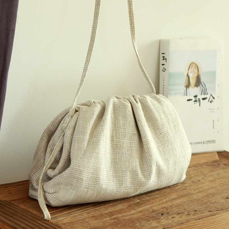 庸庸原创布包女慵懒风单肩抽绳帆布包斜挎印花民族风包包通勤小包