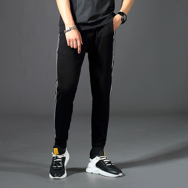 侧面白色镶边运动休闲小脚裤男修身青年潮流松紧腰抽绳束脚裤子男