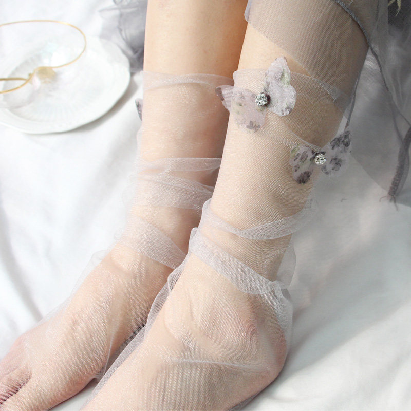 热销袜子女韩版个性百搭_新款时尚个性蝴蝶贴钻透明网纱袜子女韩版