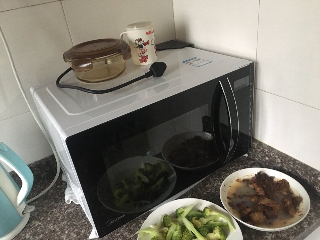 midea美的微波炉m3l205c怎么样美的m3l205c用了半年我来回答吧