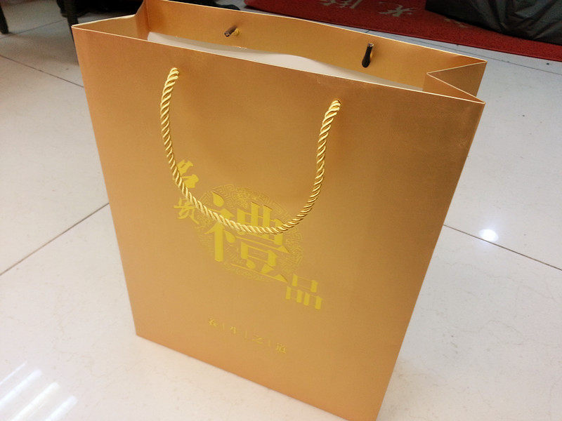 高档手提袋定做金色卡纸纸袋子定做礼品盒包装袋定制牛皮手提袋