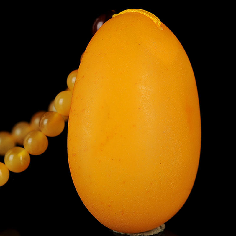 19.00克(含链) 精品磨砂款鸡油黄琥珀水滴形 挂件