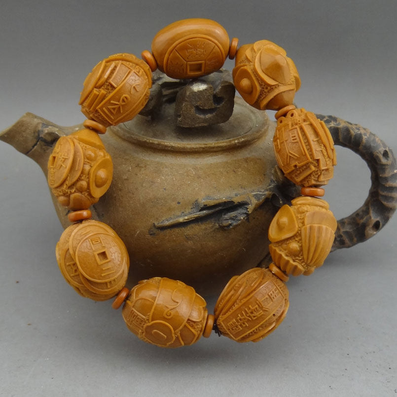 核雕名家戴红琴《财源滚滚》