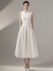 高级感气质白色连衣裙越南设计师新款大摆小翻领礼服无袖长裙通勤