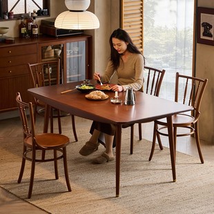 北欧全实木中古复古风饭桌小户型胡桃色原木长方形表情餐桌椅组合