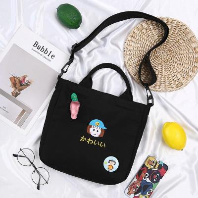 布袋包帆布斜跨包女补习包蓝色休闲帆布包女单肩斜挎内袋日式小巧