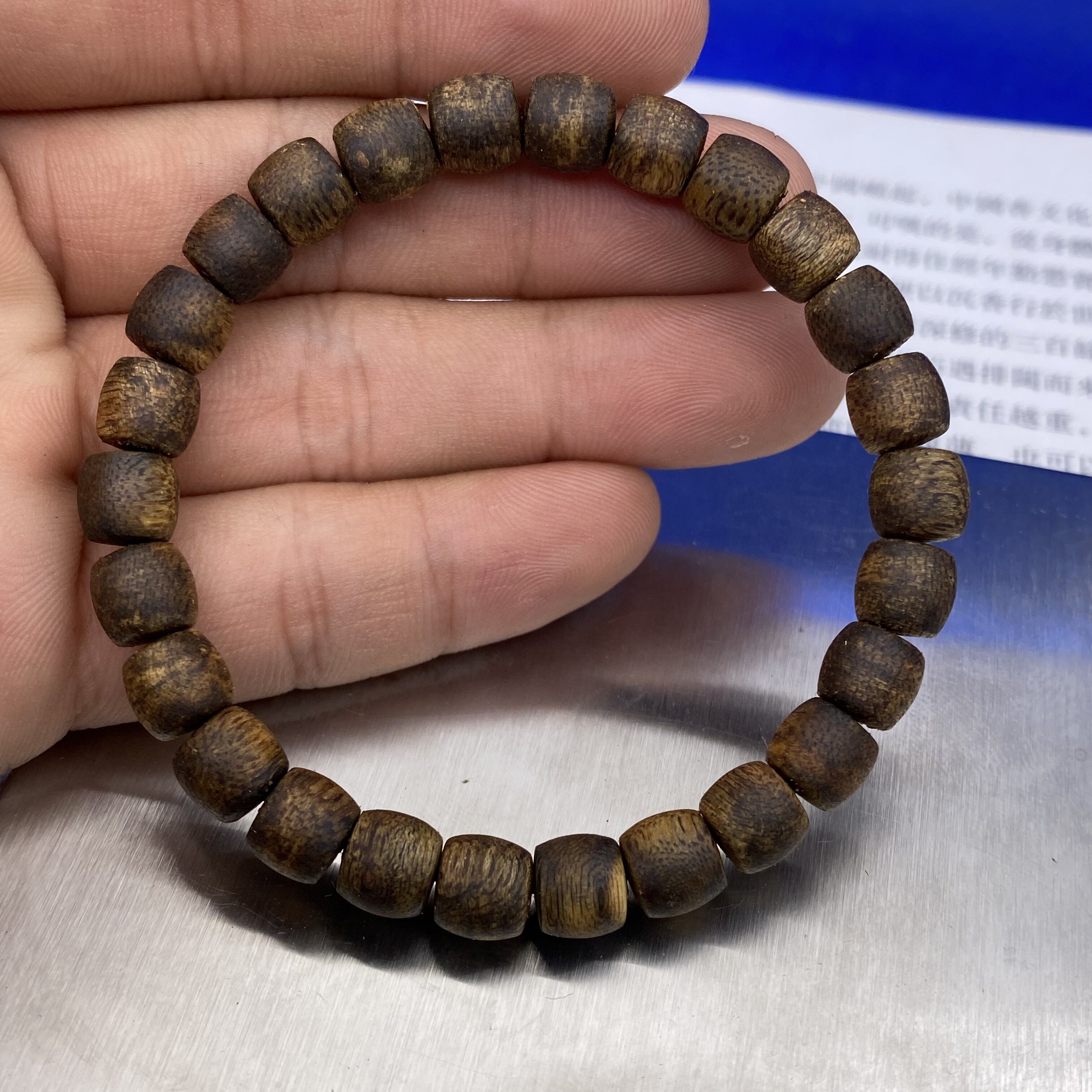 崔氏香铺的优惠券大全—至尊紫奇楠鼓珠单圈手串0.7重4.