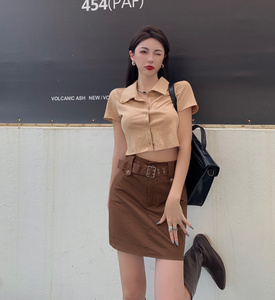 Retro short sleeve open navel T-shirt， tight hot girl thin top + slim skirt