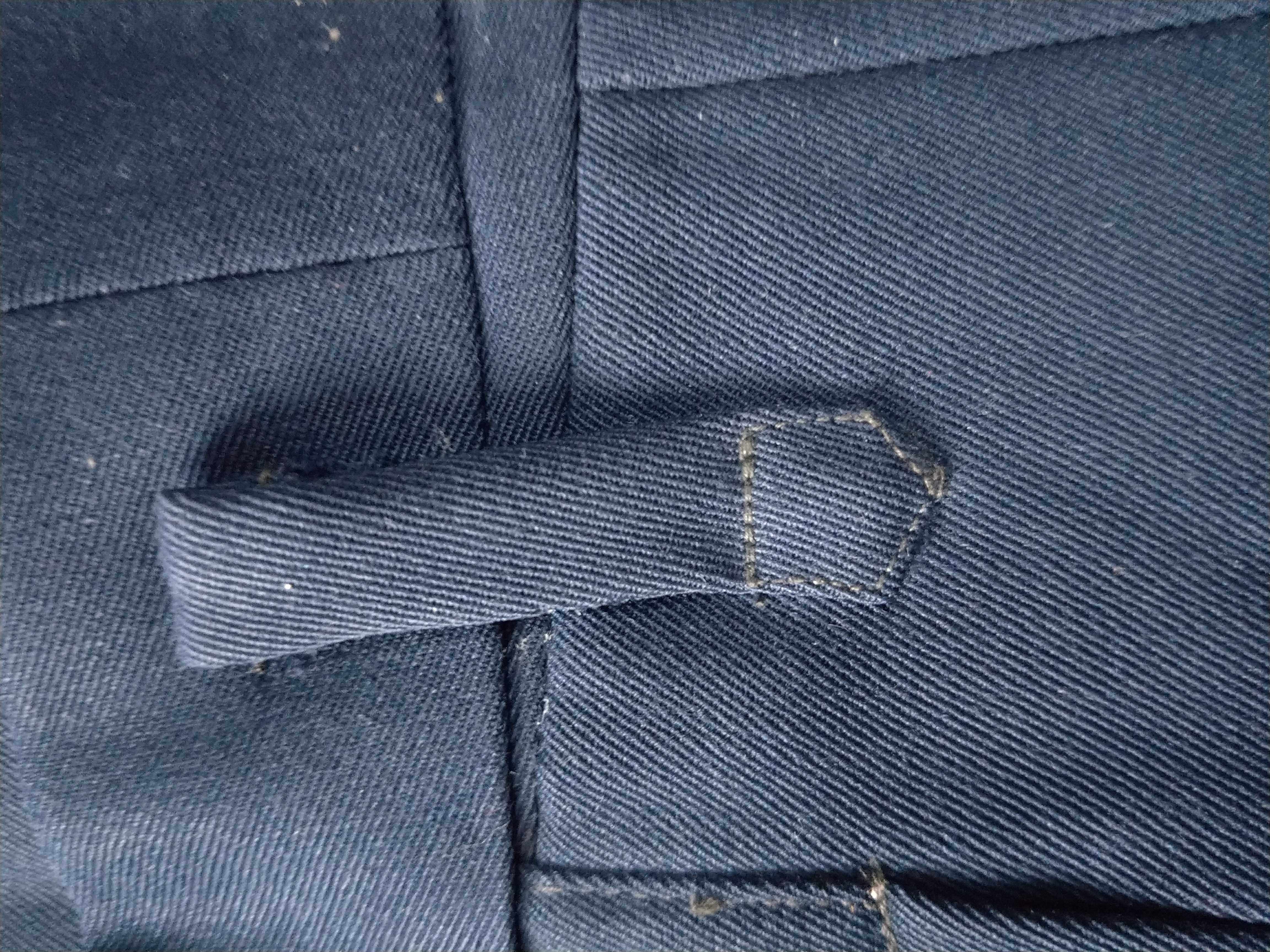 收藏七八十年代的老物件.裤b子,女裤.旁开门深蓝色.毛料九层新