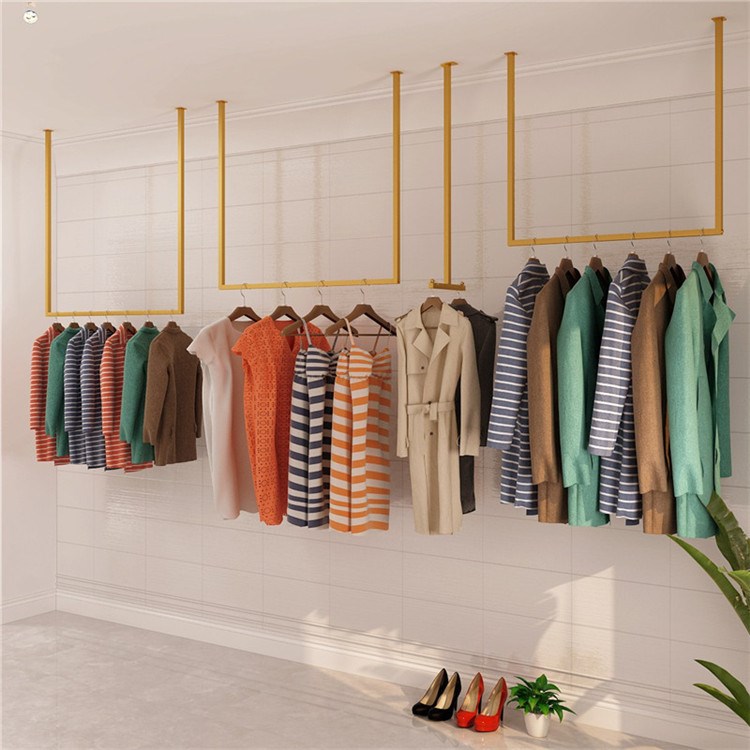 女装店货架展示架上墙吊挂图片