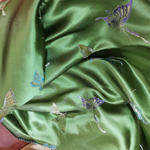 绿色蝴蝶织锦缎面料秋冬款外套连衣裙马甲汉服布料
