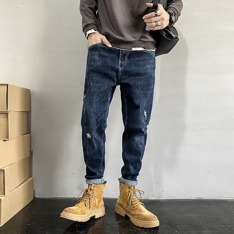 牛仔裤男宽松哈伦直筒裤春秋季休闲大码弹力破洞搭配马丁靴的长裤