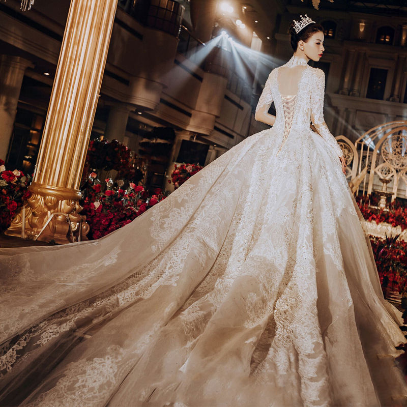 时尚晚礼服2021时髦显瘦春季婚纱2021新款气质新娘长袖星空拖尾森