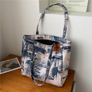 报纸包女单肩图片