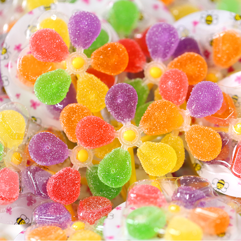 风车糖七彩旋转棒棒糖网红果汁软糖散装混合味儿童小零食糖果批发