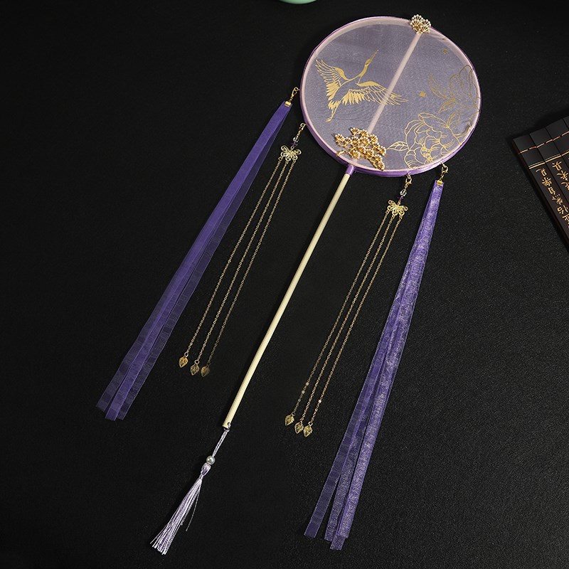 配旗袍的配饰扇子图片