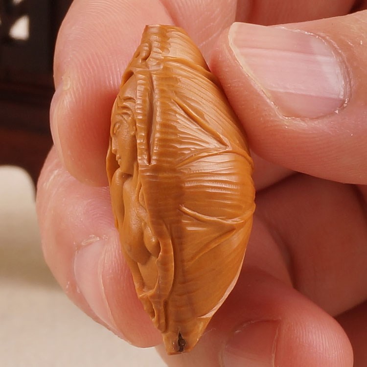 橄榄核单子雕刻吊坠图片