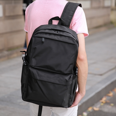 双肩包男帆布背包学生少年图片