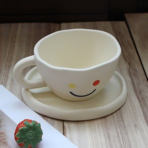 创意可爱笑脸杯图片