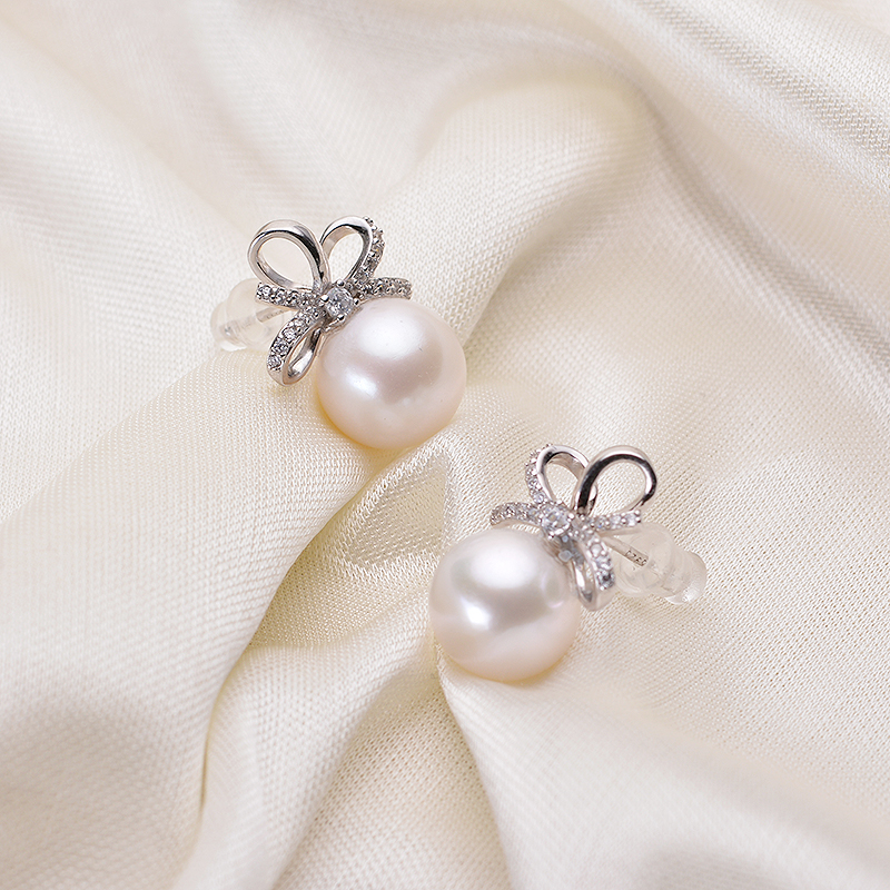 天然淡水白色珍珠银耳钉 10-11mm正圆强光微微霞爱迪生蝴蝶结设计