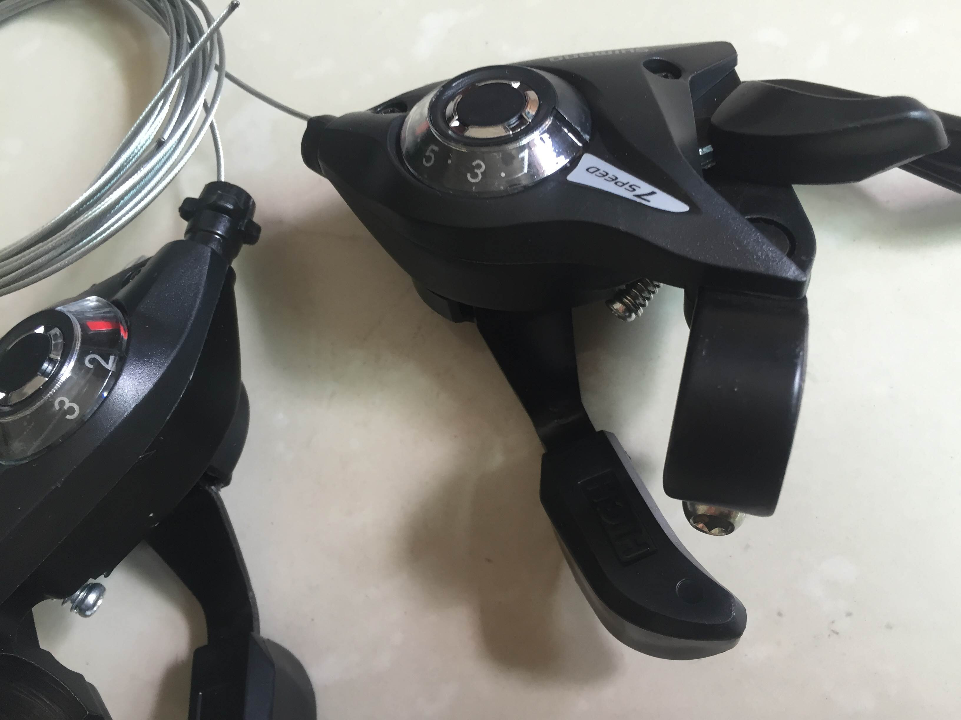 自行车转把改禧玛诺调速器山地车指拨21速24速配件变速器连体刹把