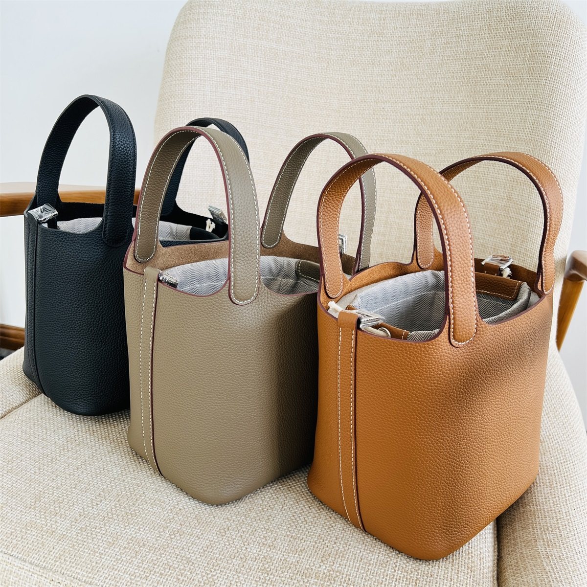 高端togo头层牛皮 tc蜡线缝制荔枝纹真皮手拎水桶包