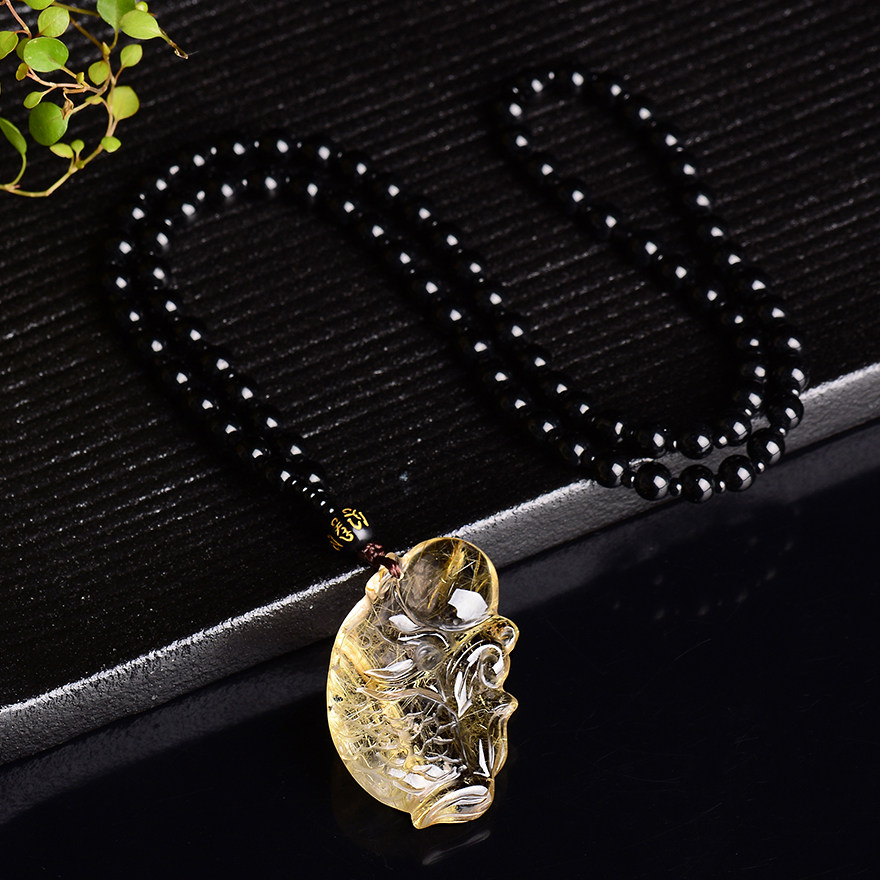 裸重21.87g天然钛晶吊坠 无面佛 - 拍卖