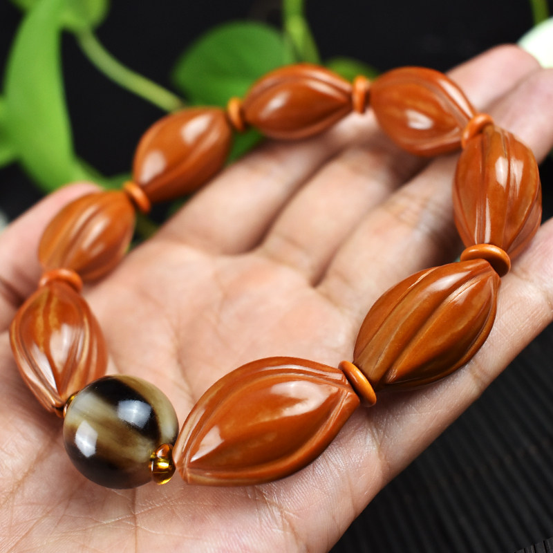 家木斯饰品旗舰店的优惠券大全—橄榄核手串搭配牛角圆款素核男女手链