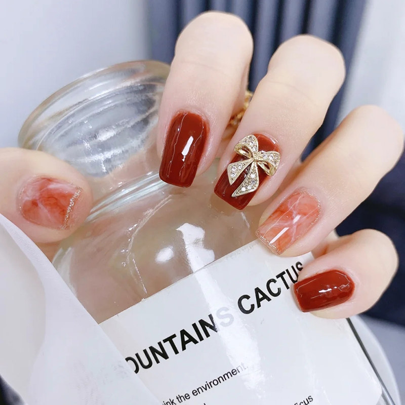 小红书可穿戴甲私人定制短款光疗假指甲番茄红色晕染金属蝴蝶结