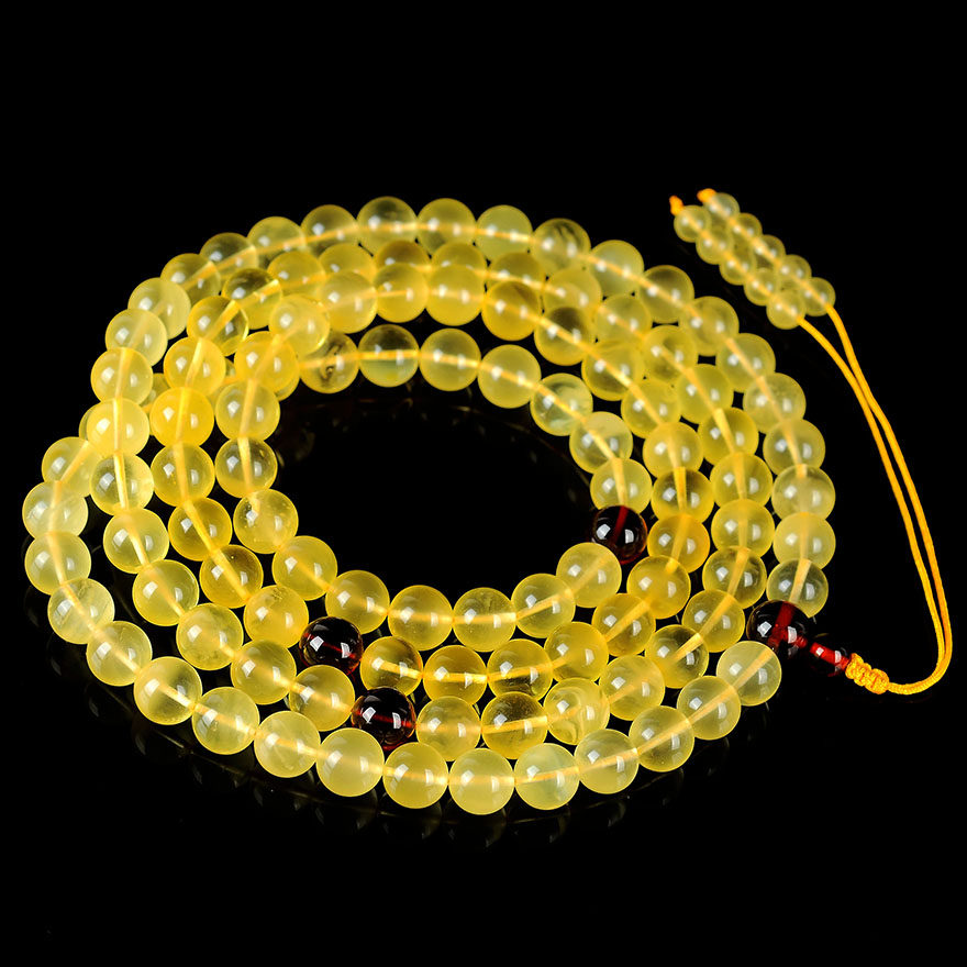 50.78克 9mm油润金绞蜜108颗佛珠【强荧光】