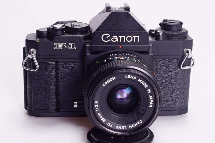 东华摄影器材的优惠券大全—佳能 canon nf1 new f1高端胶片相机 单反