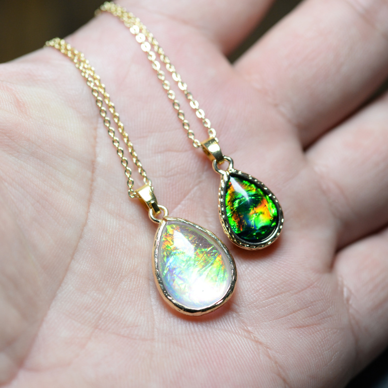 吊坠 菊花螺把玩 菊石斑彩螺吊坠已售1￥109券后价￥190天猫新品玉石