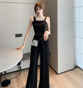 Real shooting summer seaside vacation sexy backless black thin hanging feeling one-sided shoulder strap wide leg Jumpsui